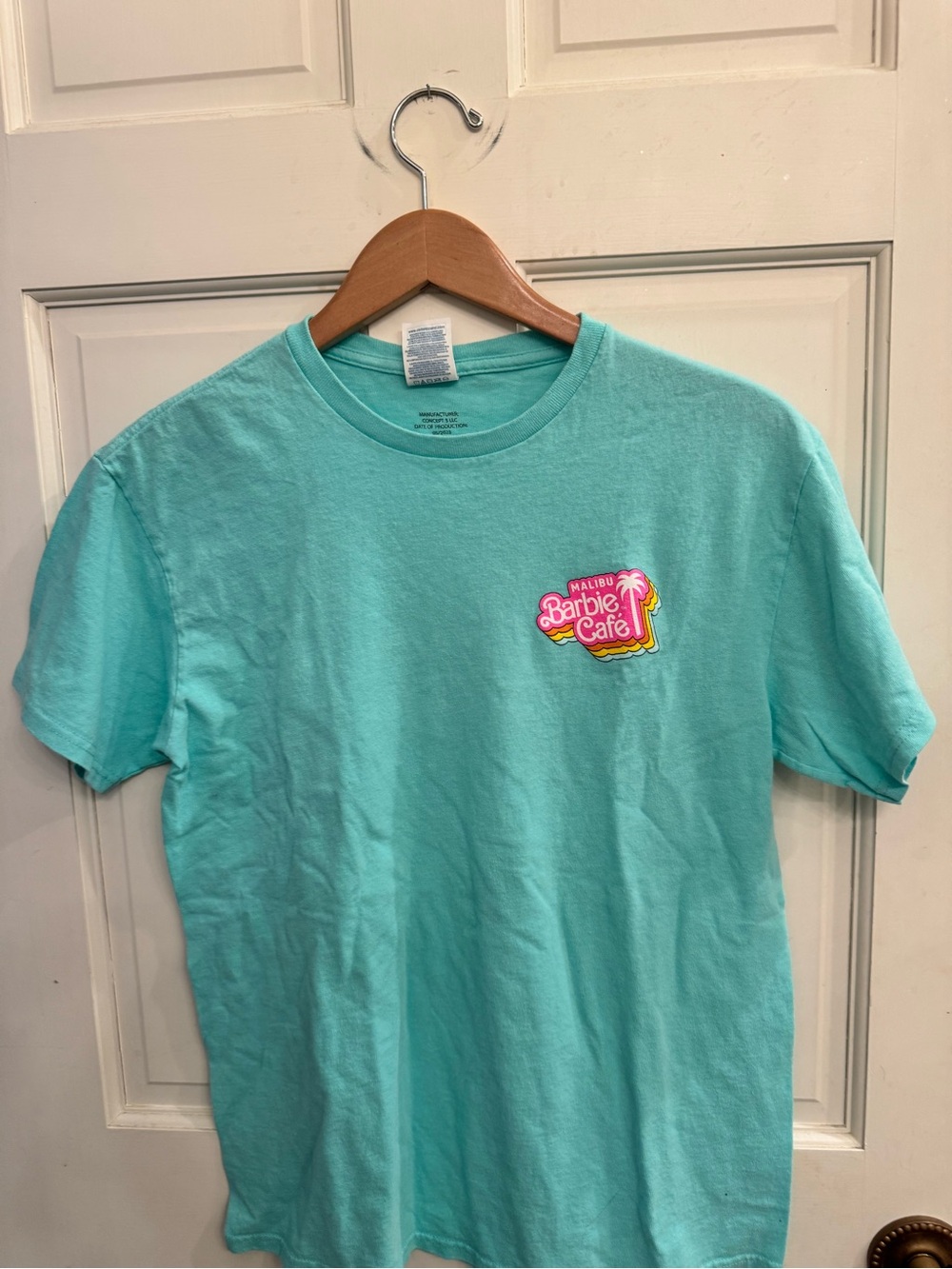Gildan Turquoise Short Sleeve Tee with Pink & Yellow Malibu Barbie Café Logo
